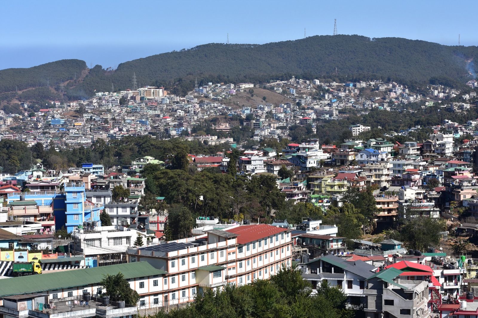 Hills Beyond the Rooftops